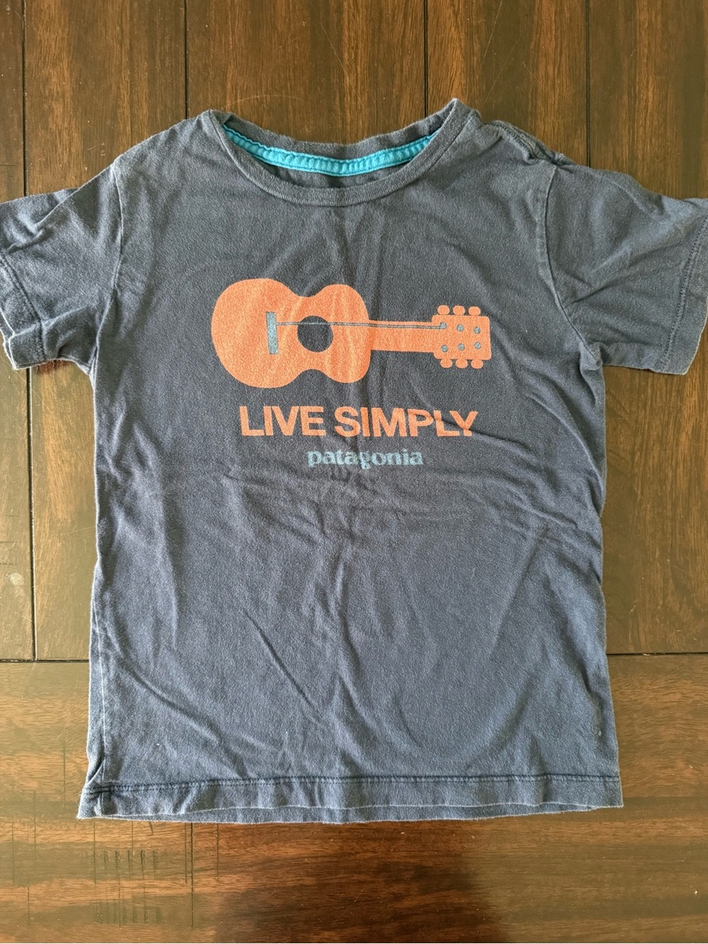 Patagonia Navy Tee with Orange Guitar Graphic